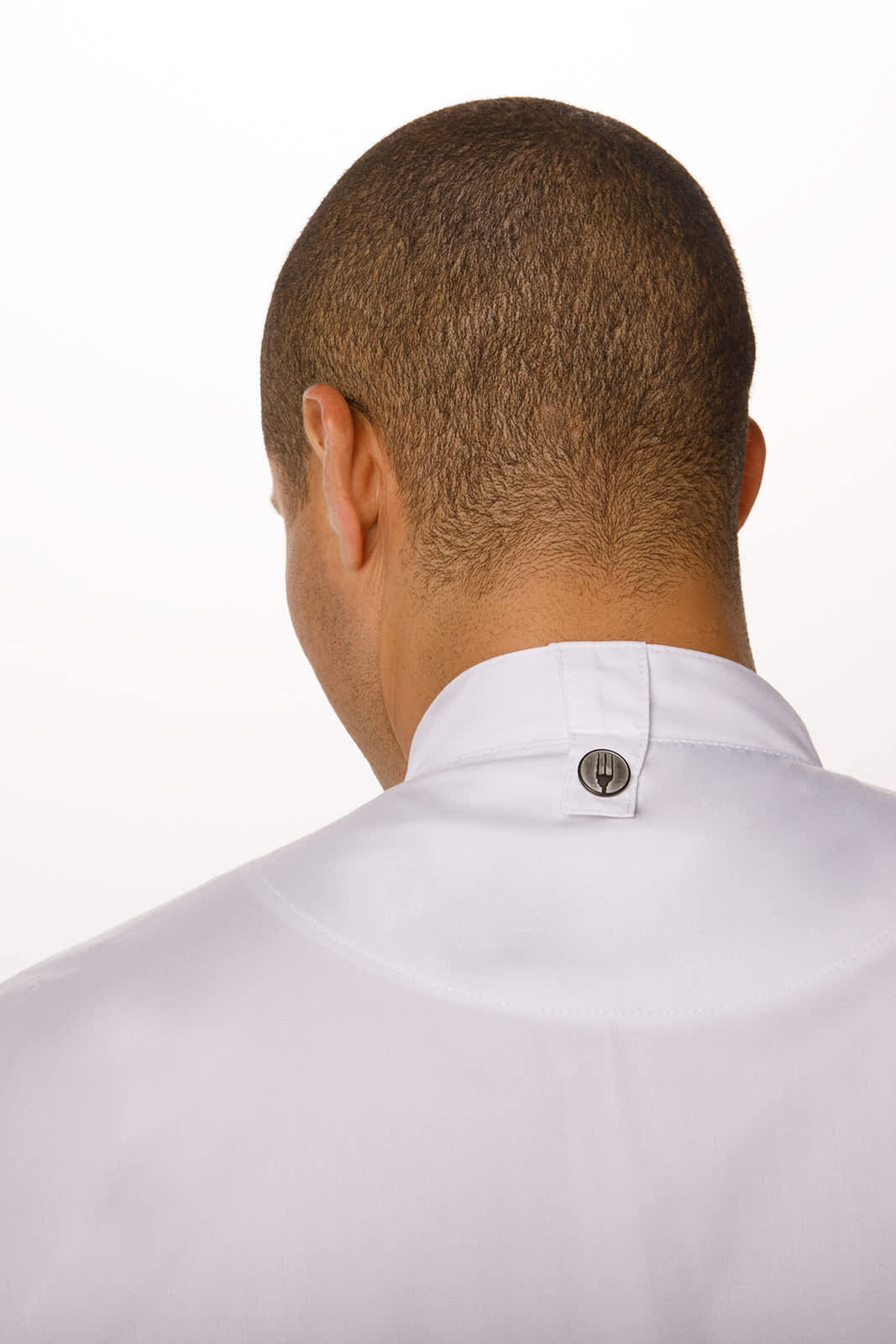A chef jacket in white featuring a press stud at the collar, shown from the back.