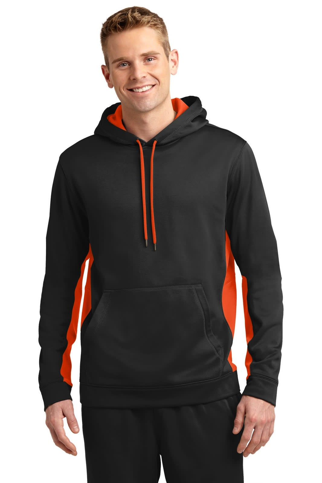 A hooded pullover in black with orange side panels, featuring a front pocket and a logo.