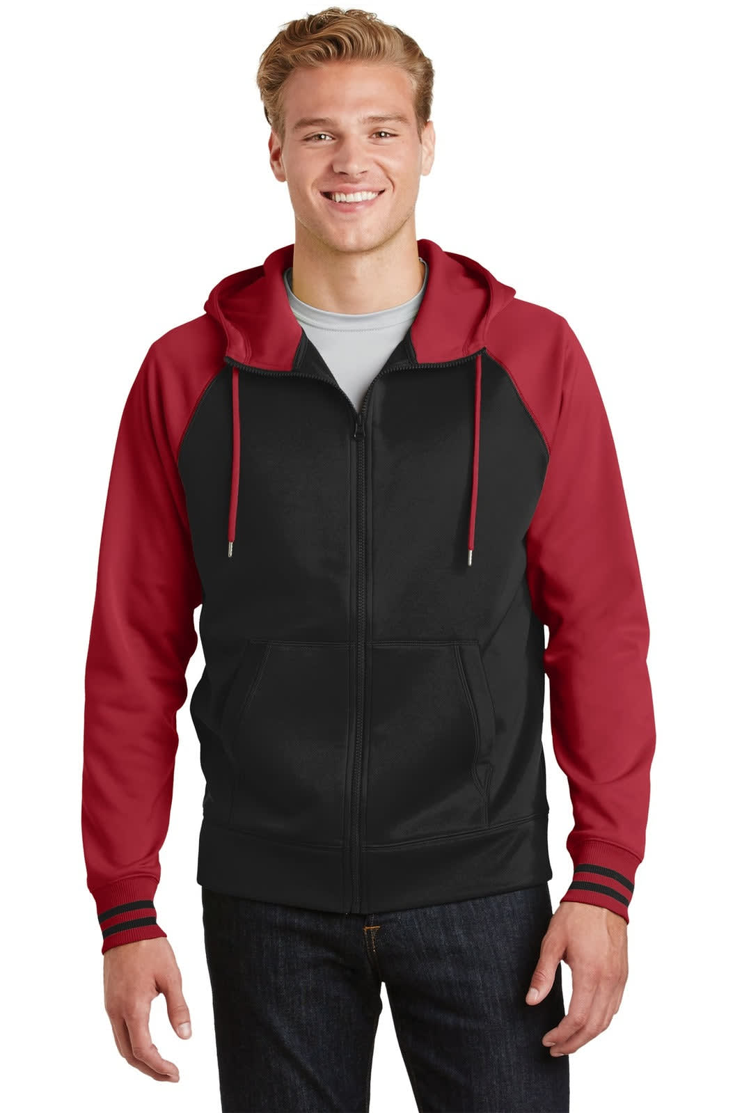 A full-zip hooded jacket in black and red, featuring a two-tone design and a hood. It has a logo on the chest area.