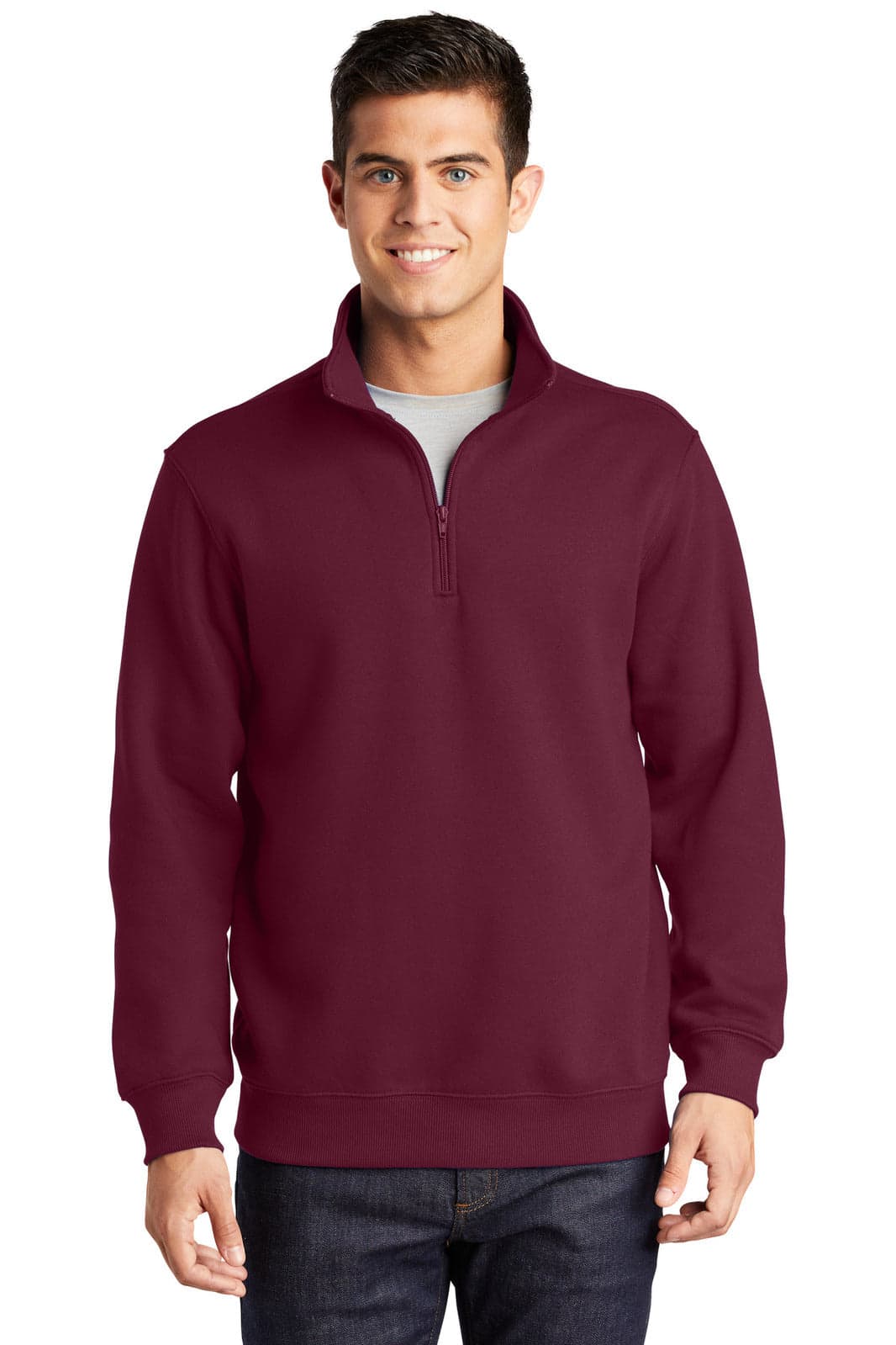 A maroon Sport-Tek 1/4-zip sweatshirt on a model, featuring a logo on the left chest.