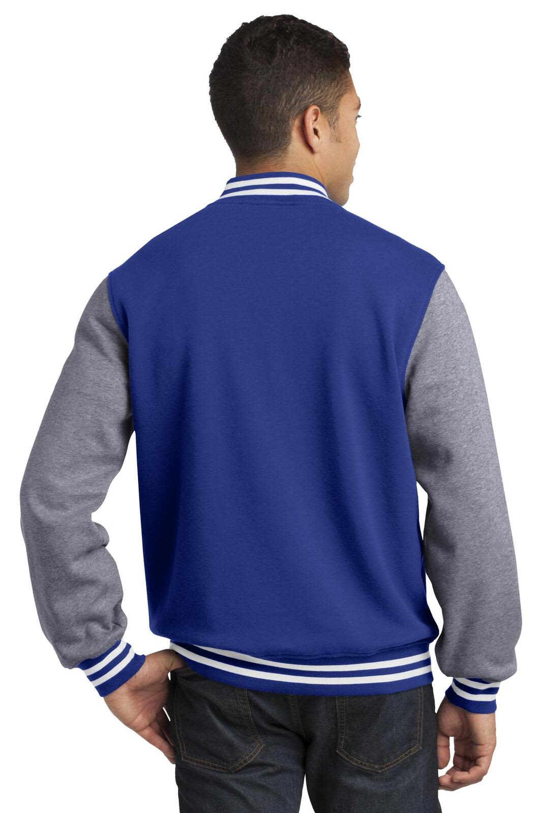 A blue and grey Sport-Tek fleece letterman jacket featuring a logo on the back, with striped cuffs and collar.