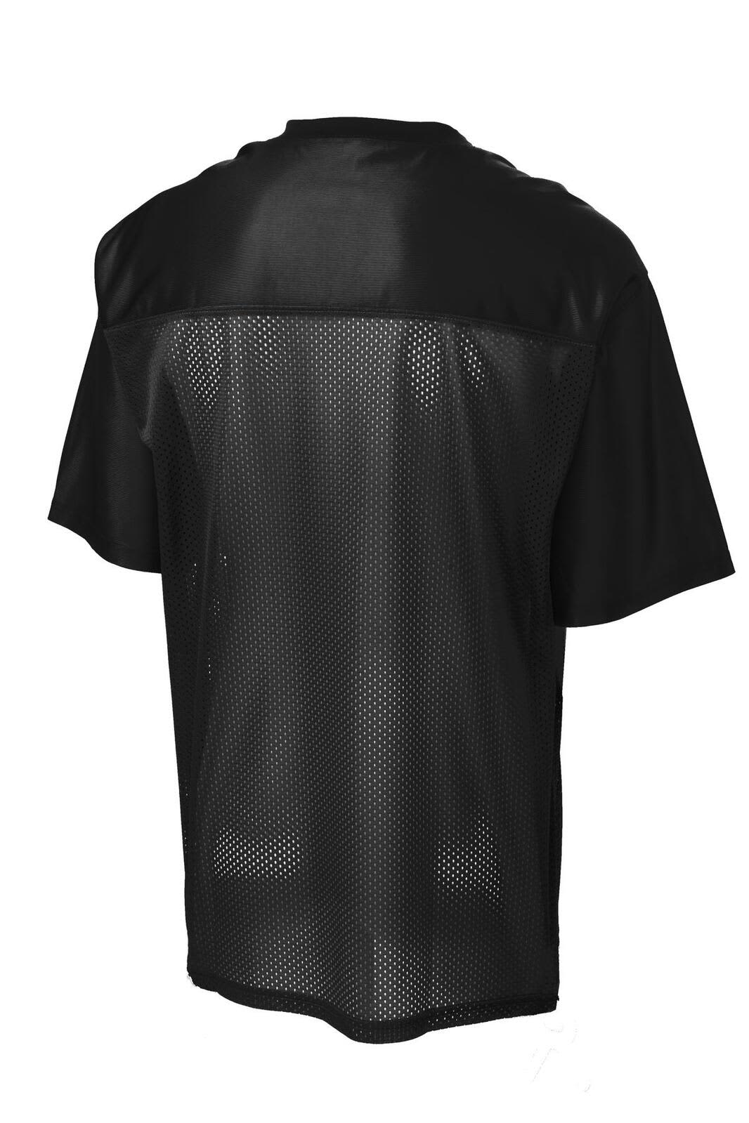A black replica jersey featuring a mesh back and short sleeves, with a logo present.