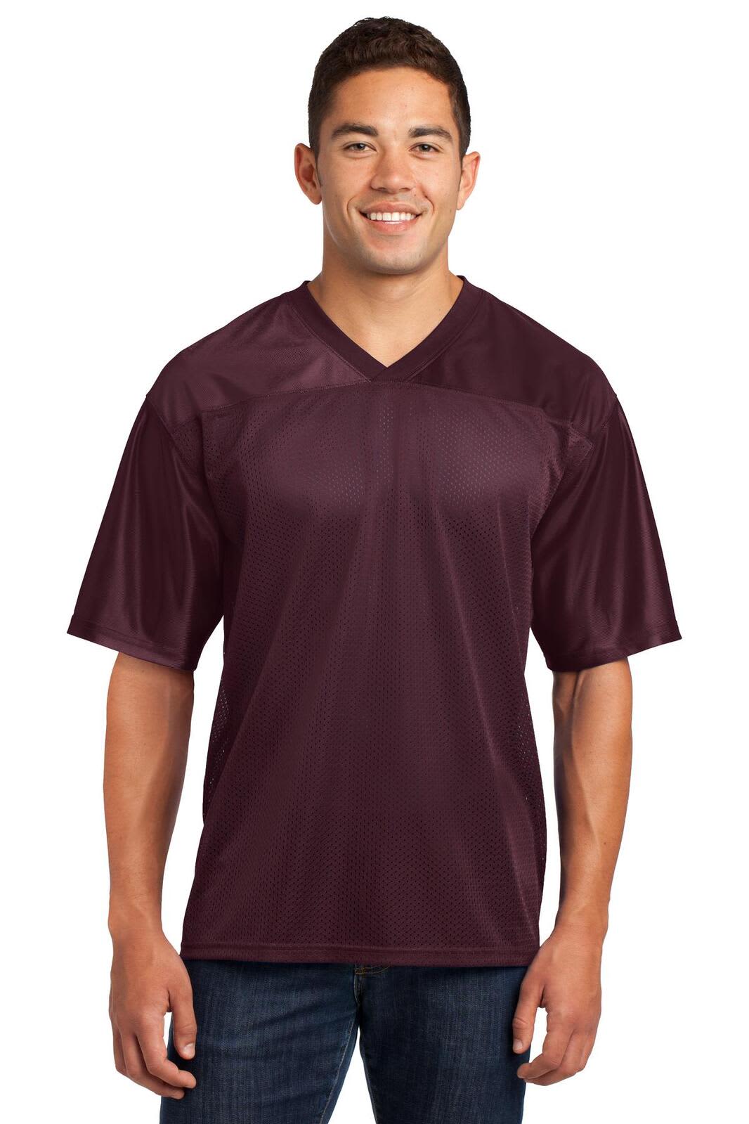A maroon sports jersey with short sleeves, featuring a v-neck design and a logo.