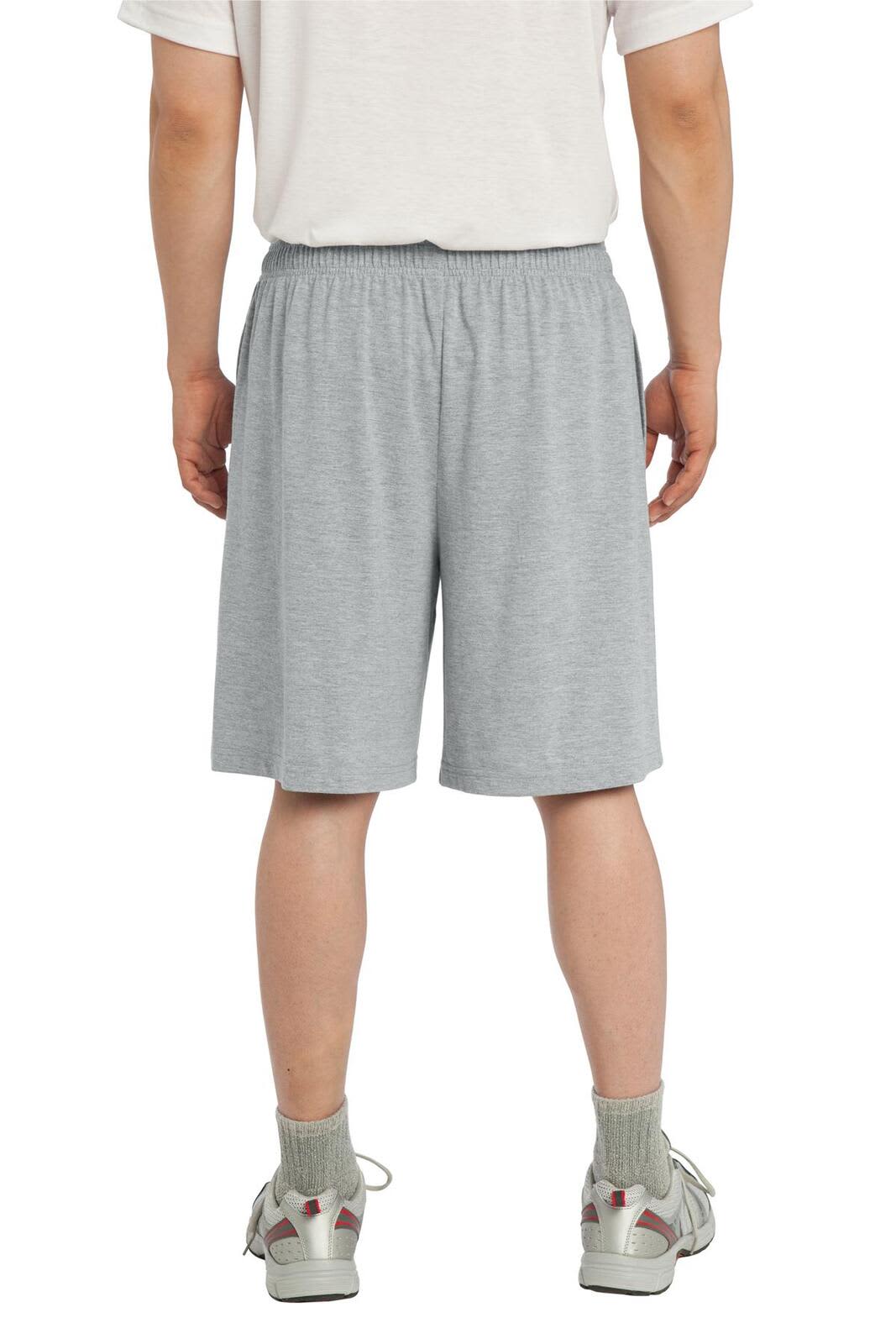 Grey sports shorts with pockets, featuring an elastic waistband and a simple design.