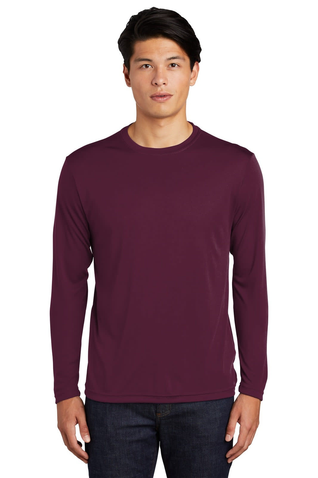 A long-sleeve maroon t-shirt featuring a logo, modelled by a man against a plain background.