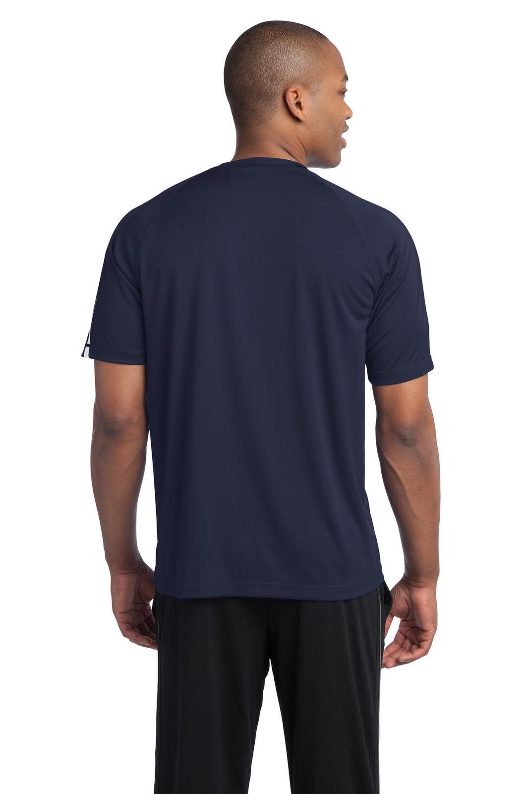 A man is wearing a navy blue Sport-Tek Colorblock PosiCharge Competitor Tee, showcasing the back view of the shirt.