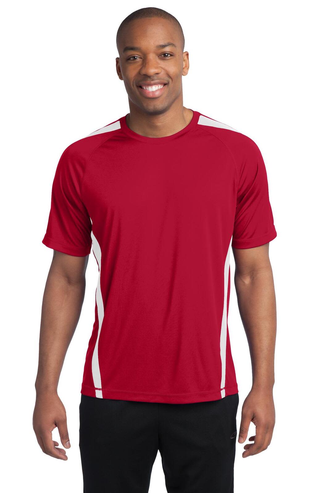 A red t-shirt with white colourblock accents and a logo, displayed on a smiling male model.