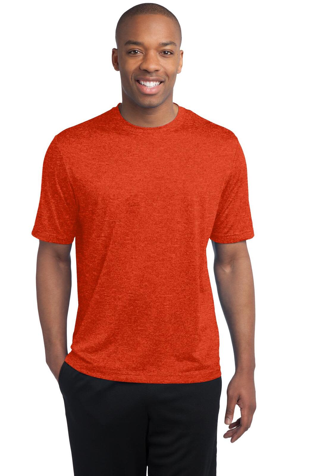 A man wearing a heather-red Sport-Tek Contender Tee, featuring short sleeves and a simple design.