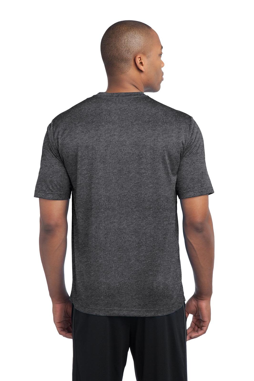 A person wearing a dark heather grey Sport-Tek Heather Contender Tee from the back, featuring short sleeves.