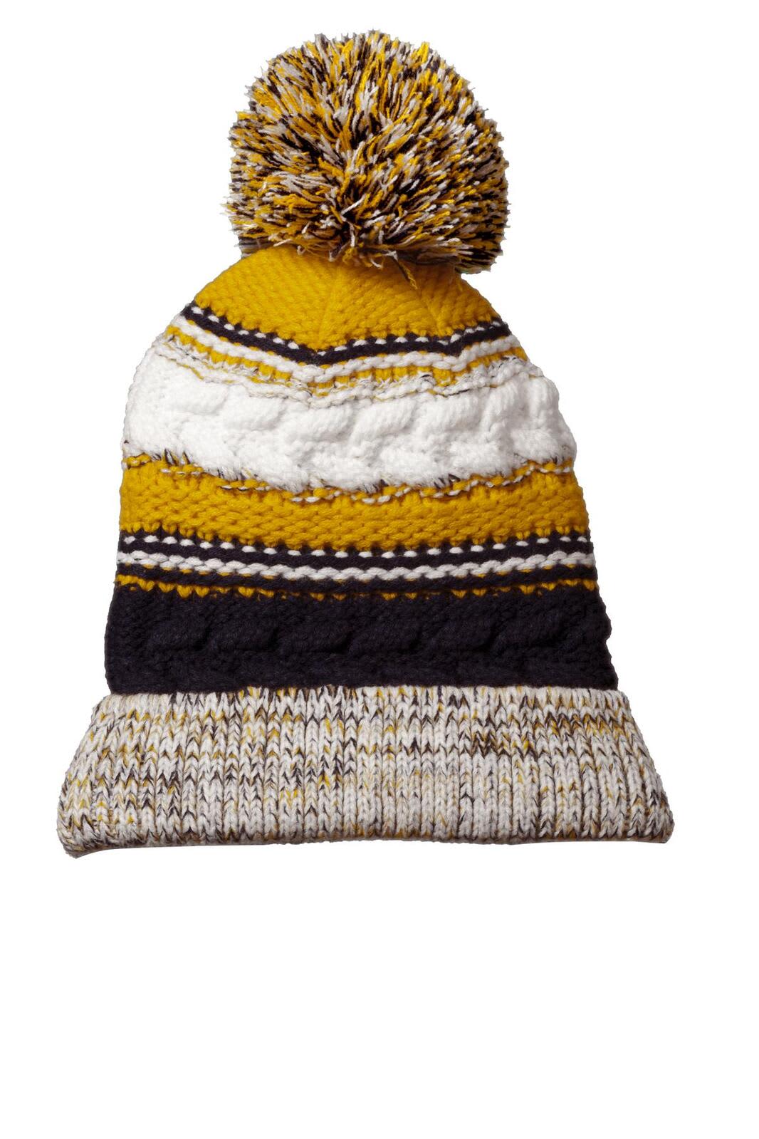 A knitted beanie featuring a pom pom, with stripes in yellow, white, and navy. Includes a brand logo.