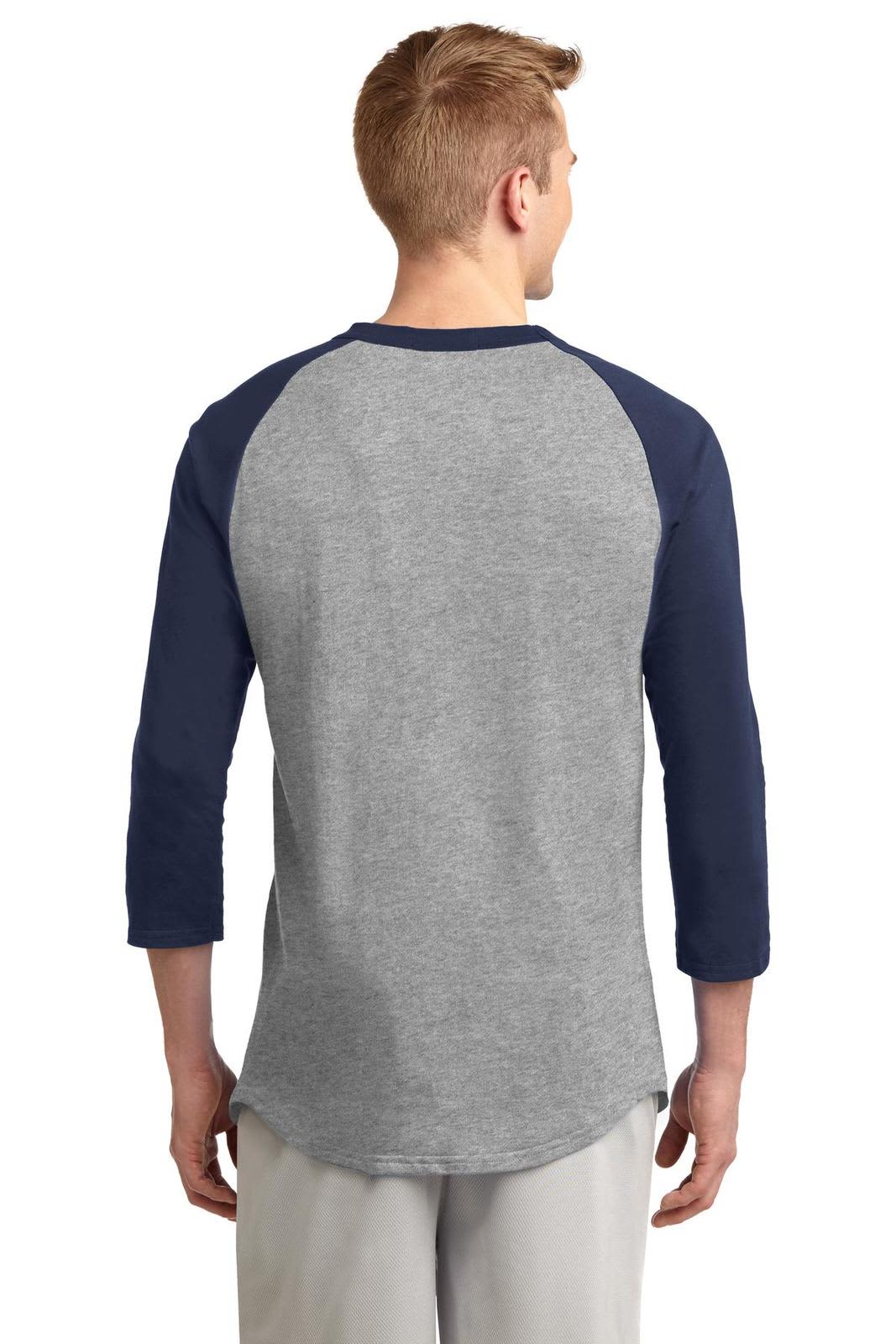 A man wearing a grey and navy Sport-Tek Colorblock Raglan Jersey from the back, showcasing the three-quarter sleeves.