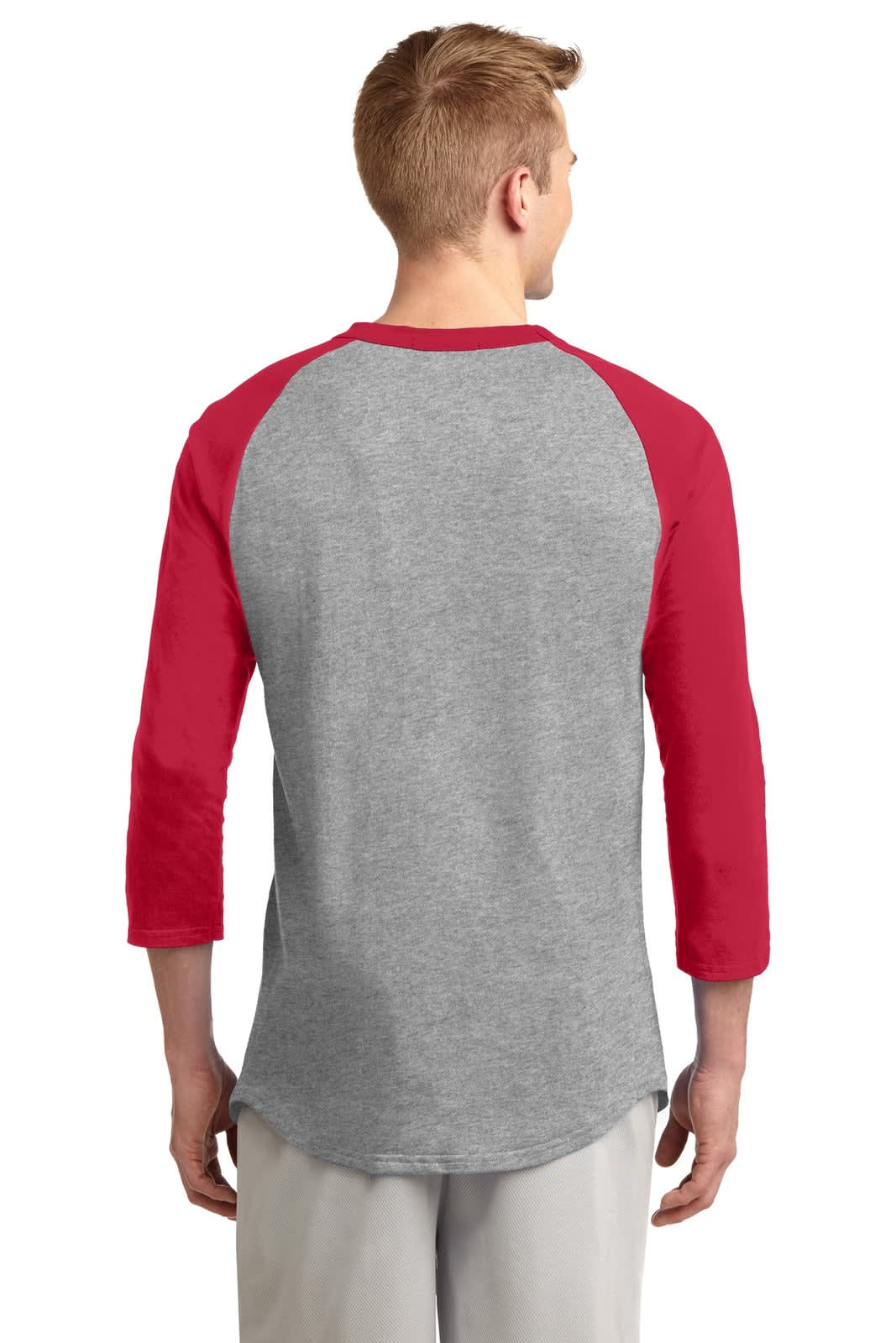 A grey Sport-Tek Colorblock Raglan Jersey featuring red sleeves, displayed from the back. Includes a logo.