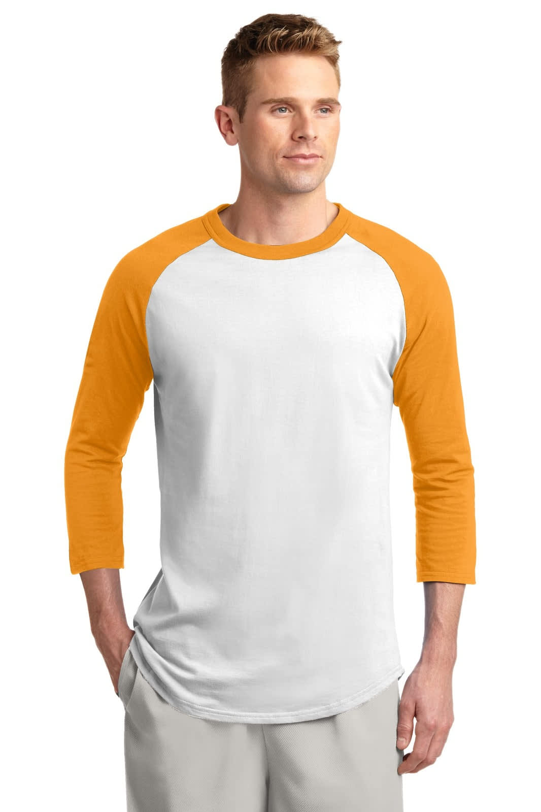 A man wearing a Sport-Tek Colourblock Raglan Jersey with white body and orange sleeves, featuring a logo.