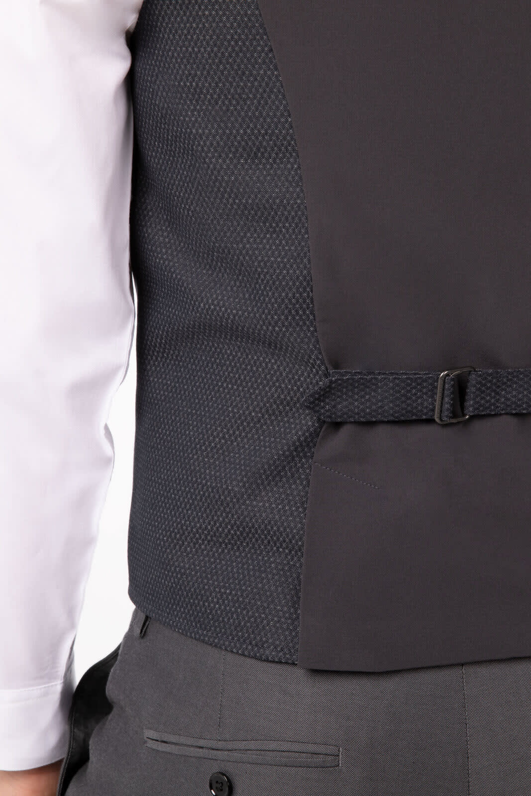 A men's vest in dark grey with a textured pattern, featuring a buckle detail on the side.