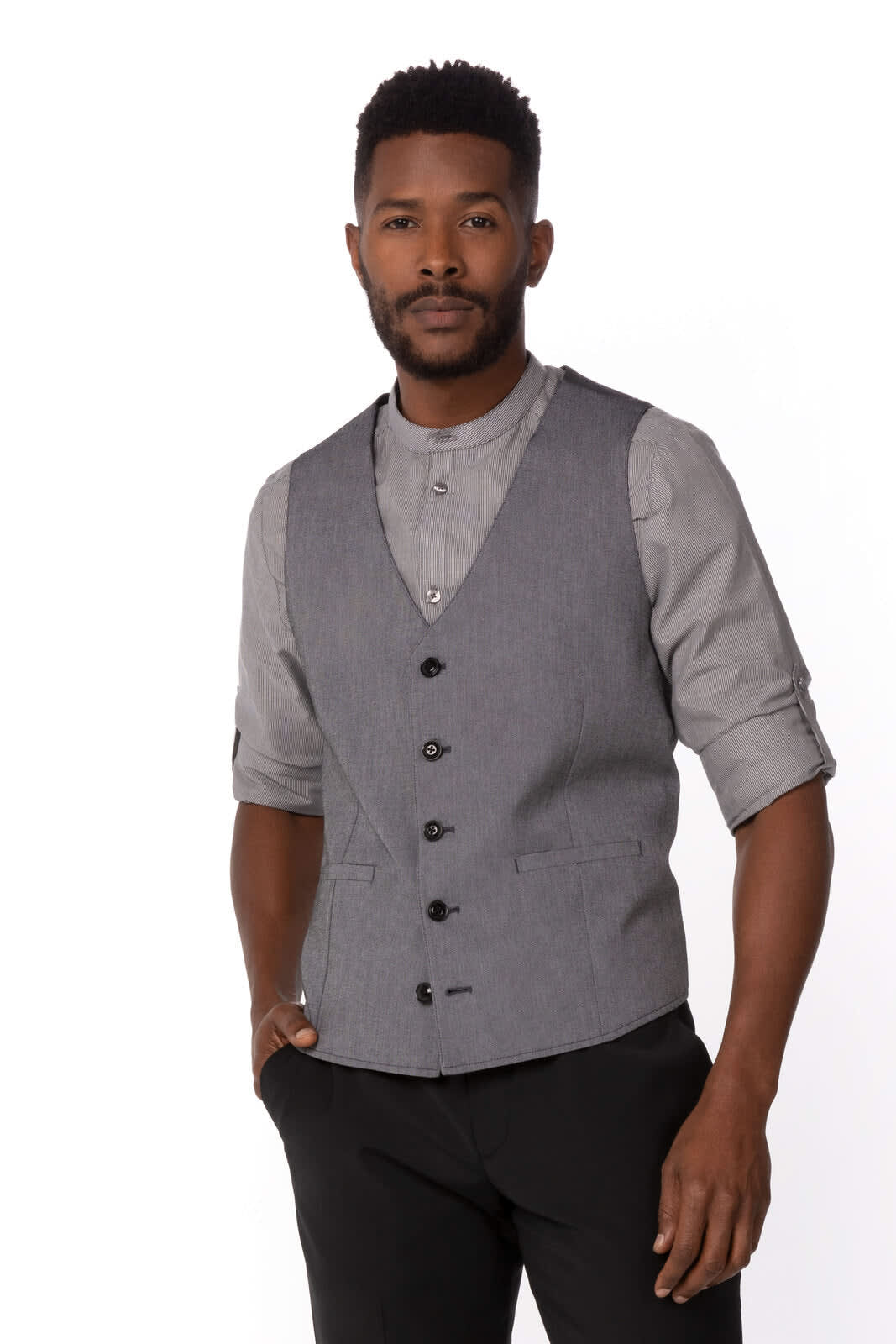 A men's grey vest with buttons, worn over a light grey shirt, featuring a fitted design and pockets.