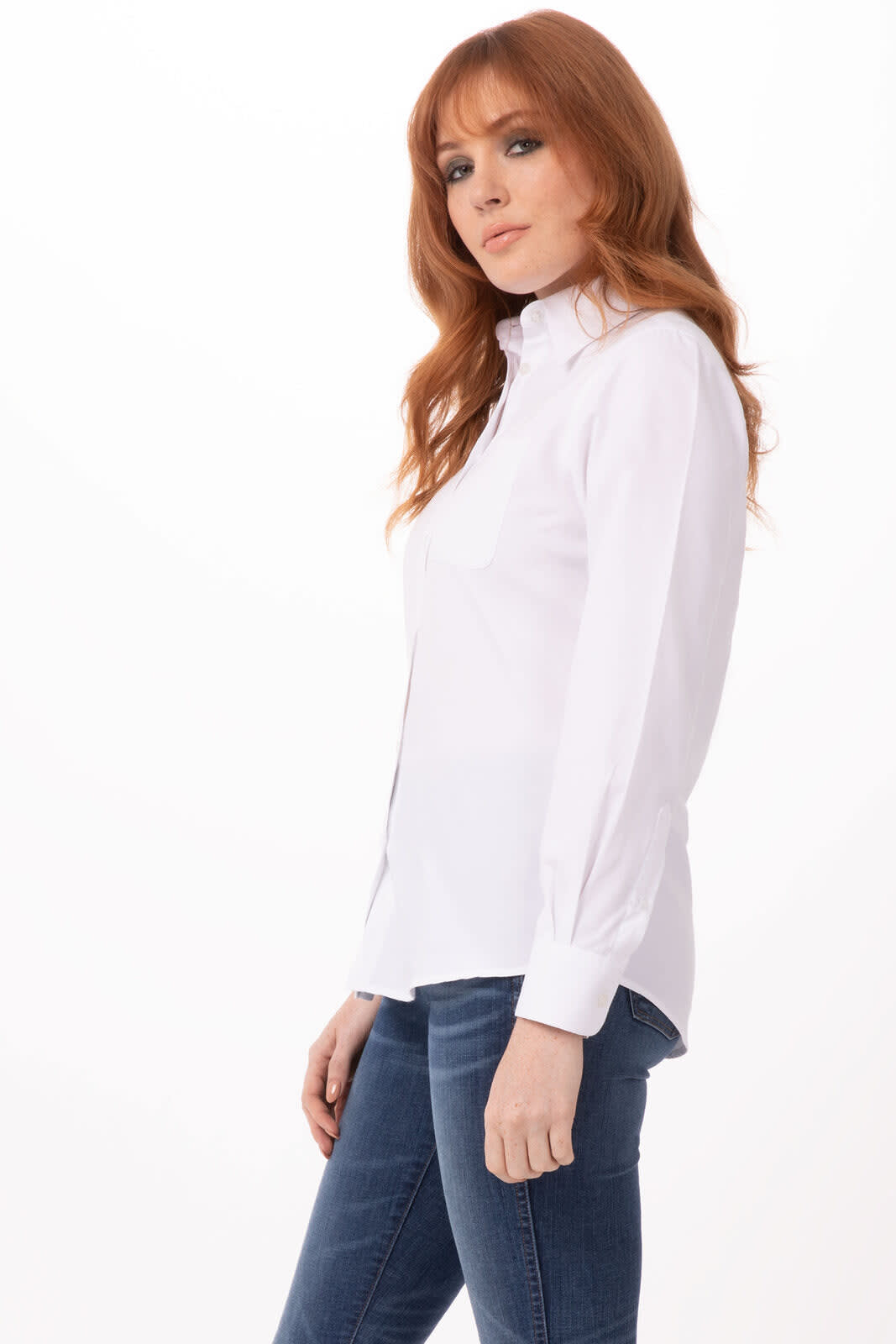 A white button-up shirt with a collar, featuring long sleeves and a front pocket, displayed on a model.