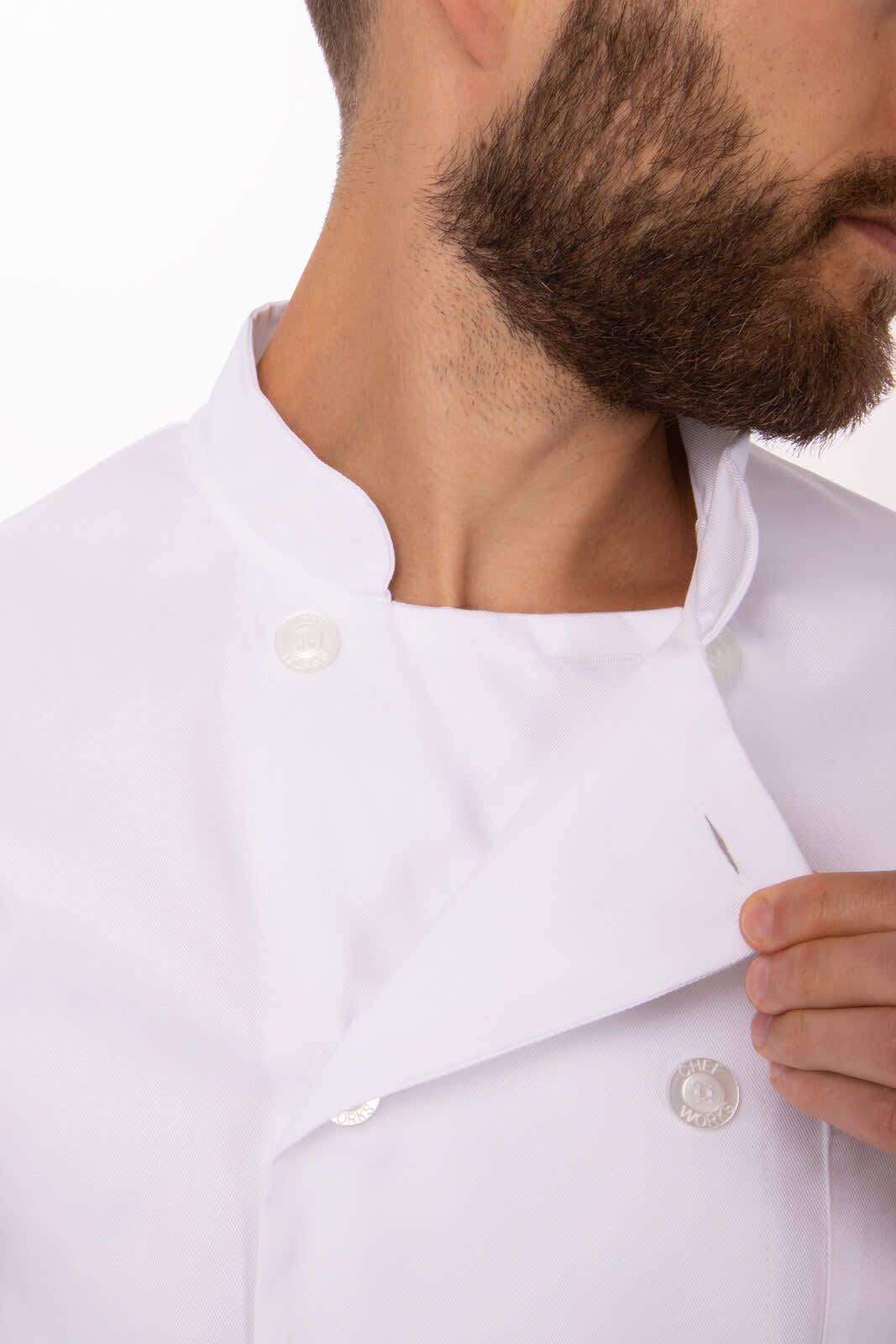 A white chef jacket featuring a stand-up collar and double-breasted design, with a logo on the chest.