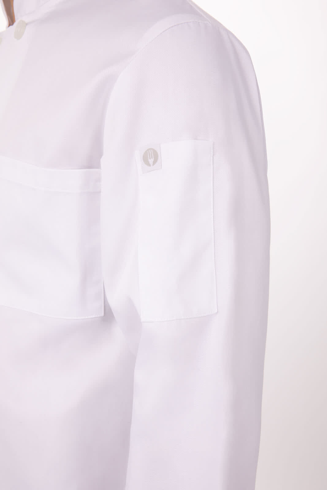 A white chef jacket featuring a chest pocket and a sleeve pocket, with a button detail on the sleeve.
