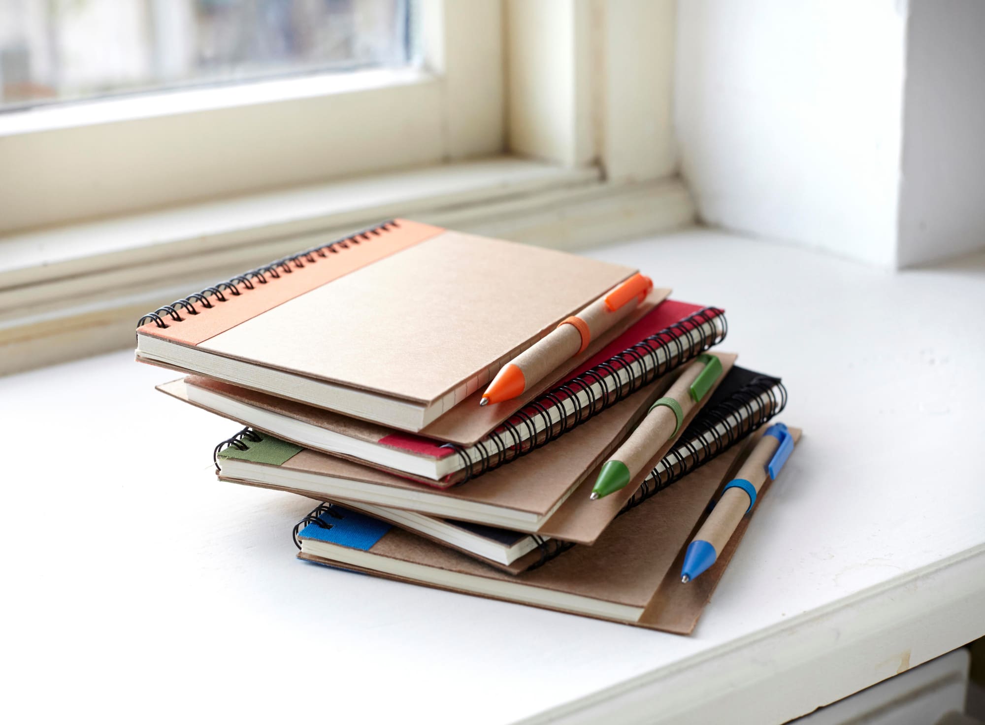 Wire bound notebook with ballpen.