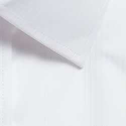 A close-up of a white shirt collar featuring a sleek design and subtle stitching details.