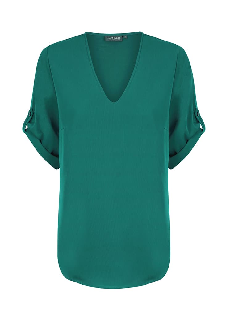 A green V-neck shirt with rolled sleeves and a relaxed fit, featuring a subtle logo.