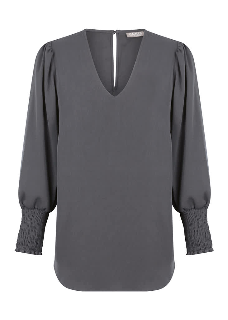 A grey Cleo V Neck shirt featuring a v-neckline and puffed sleeves with smocked cuffs. It has a logo tag.