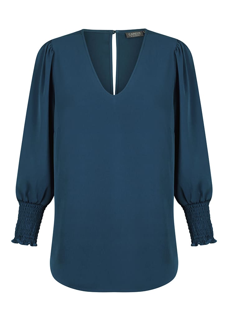 A teal V-neck shirt with puffed sleeves and smocked detailing at the cuffs, featuring a keyhole back.