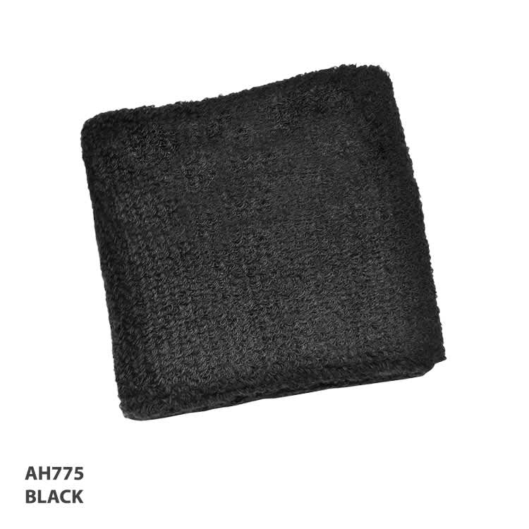A black wristband made of textured material, featuring a logo or branding.
