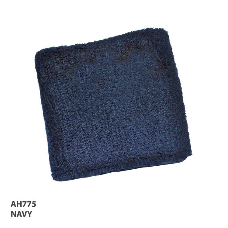 A navy wristband with a textured finish, featuring a logo or branding.