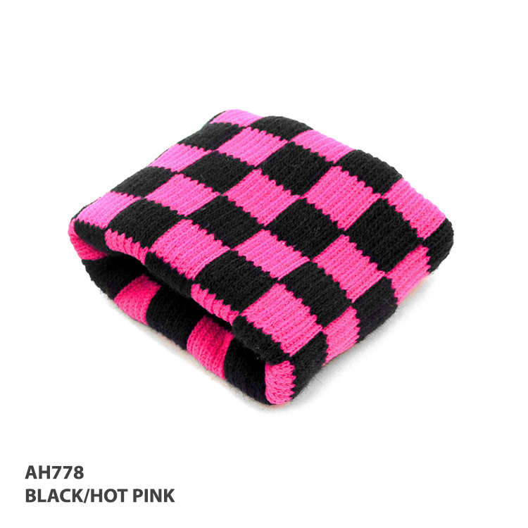 A checkered wristband in black and hot pink, featuring a knitted design. It has a branding logo on the side.