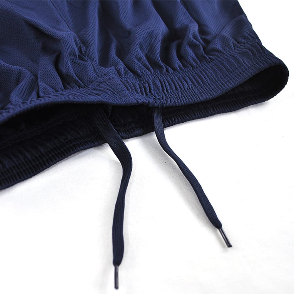 Navy sports shorts featuring an elastic waistband and adjustable drawstrings. The fabric appears breathable and lightweight.
