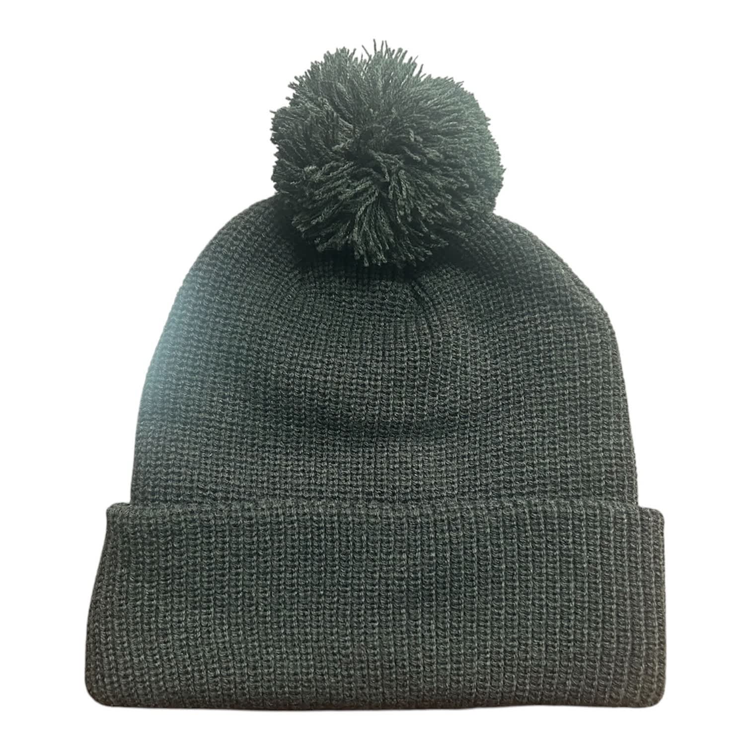 6 SEAM KNITTED BEANIE W/- POM POM HE-3061 A dark grey knitted beanie featuring a pom pom on top and a folded cuff. It has a branding logo.
