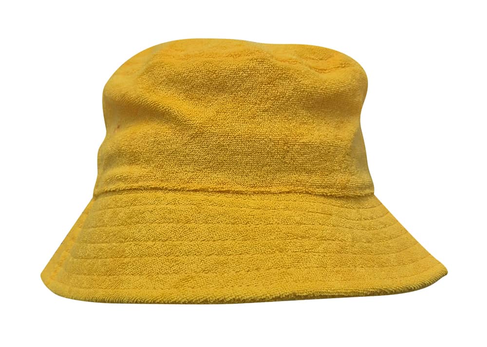 Terry Towelling Bucket Hat HE-3970 A yellow Terry Towelling bucket hat with a soft texture and a wide brim. It features a logo on the side.