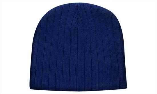 Cable Knit Beanie - Toque HE-4189 A cable knit beanie in dark blue with a ribbed texture and a small logo.