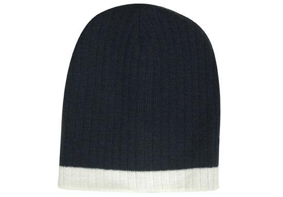 Two Tone Cable Knit Beanie - Toque HE-4195 A two-tone cable knit beanie in dark blue with a light grey cuff, featuring a logo.