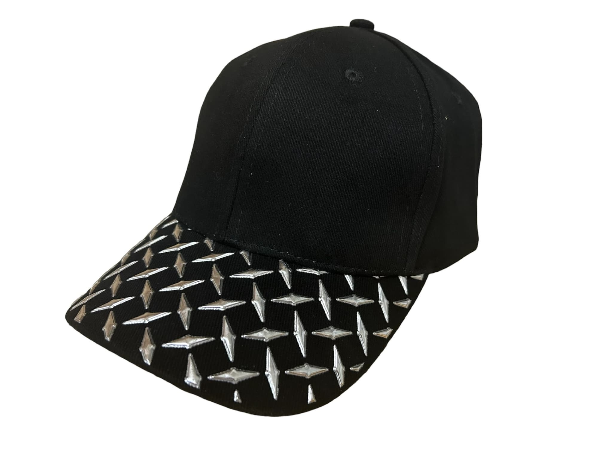 Brushed Heavy Cotton with Checker Plate on Peak HE-4044 A black cap featuring a checker plate design on the peak and a logo on the front.