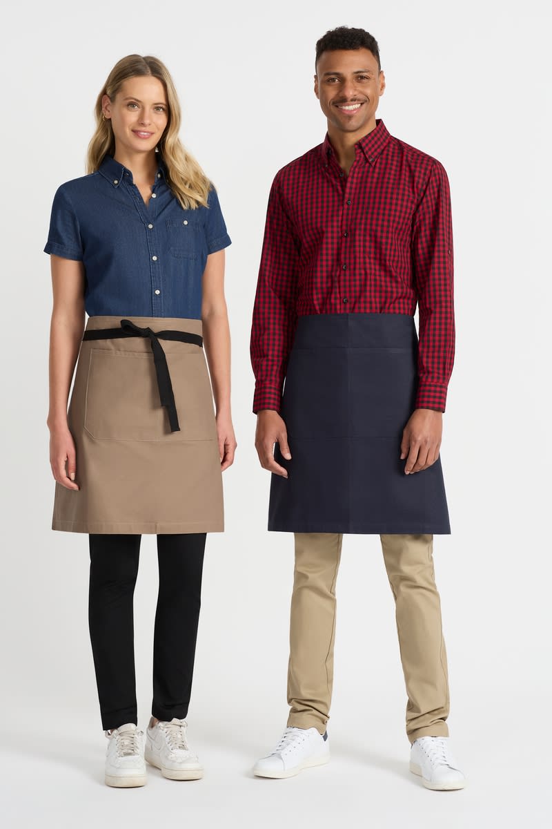 A ladies short sleeve shirt in denim blue, styled with a button-up design, displayed alongside a checkered red shirt.