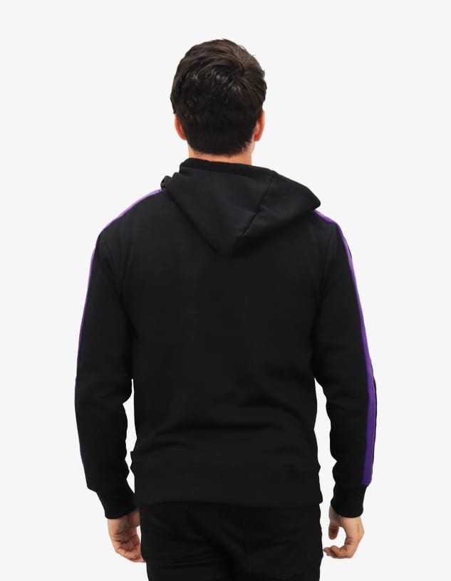 A black hoodie features purple accents on the sleeves and a hood, with a logo visible on the back.