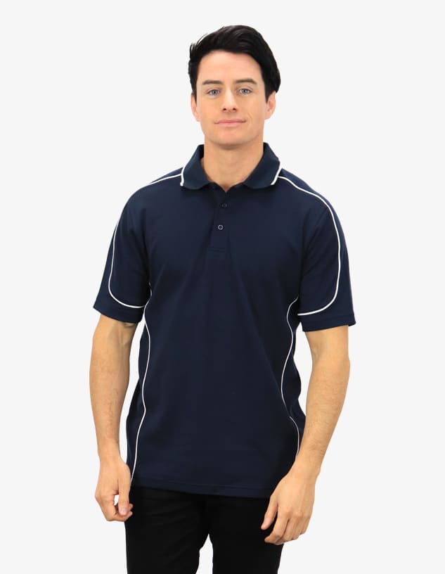 A navy polo shirt with contrasting white piping, featuring a logo. Worn by a model.