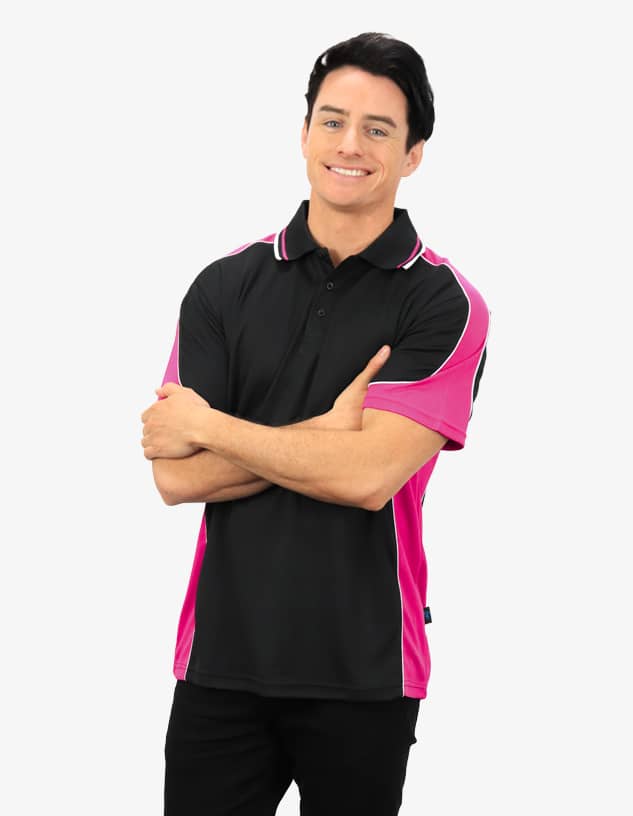 A black and pink polo shirt featuring a logo, modelled by a man with a friendly smile.