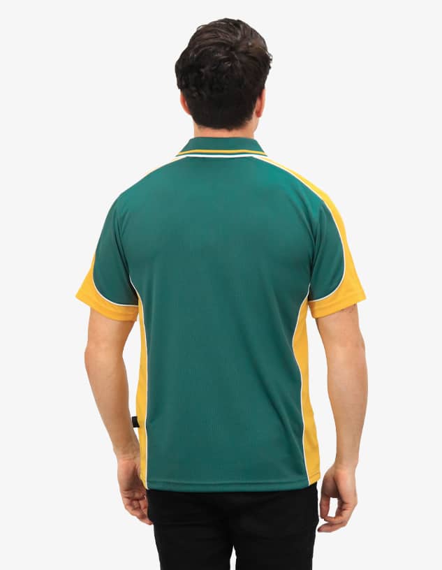 A polo shirt in green and yellow with contrasting side panels and a logo on the sleeve.