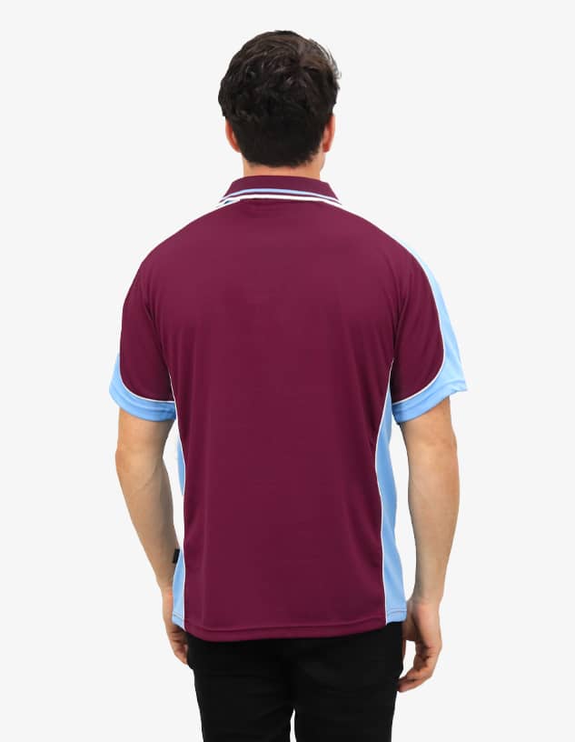 A polo shirt in maroon and light blue, featuring a logo on the back.