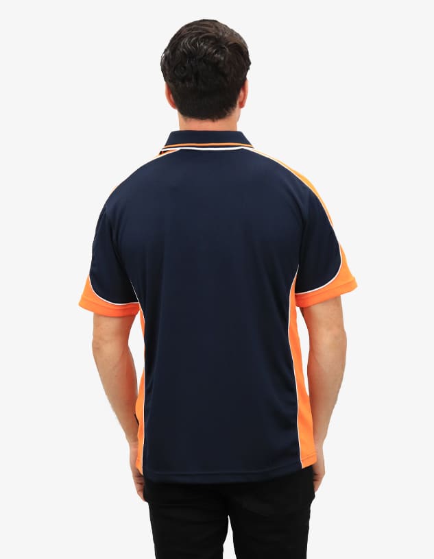 A polo shirt in navy blue with orange accents and a logo on the back.