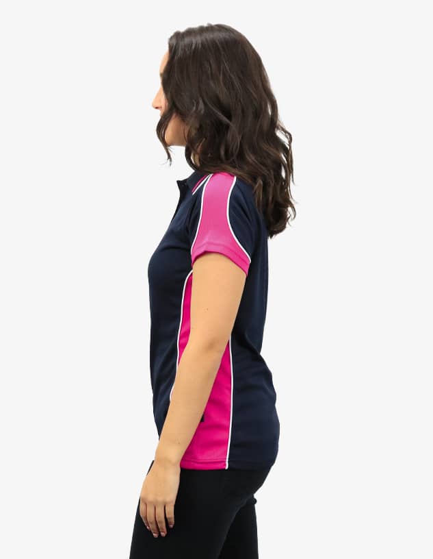 A polo shirt in navy blue with pink accents and white piping. Features a logo on the chest area.