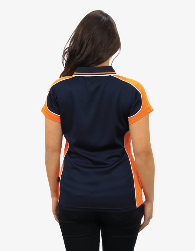 A polo shirt in navy and orange, featuring a logo, displayed from the back on a model.