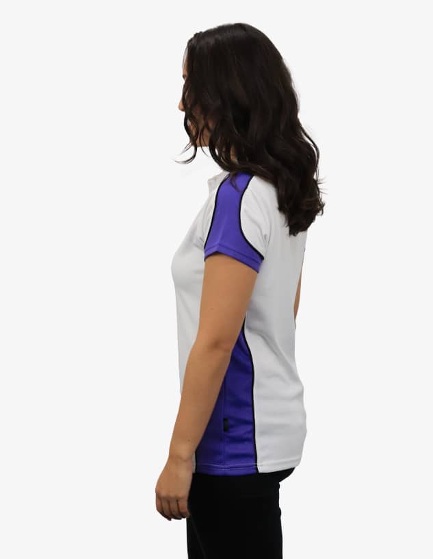 A polo shirt in white and purple, featuring a logo, displayed on a model from the side.