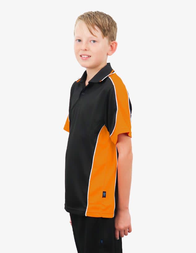 A child wearing a black and orange polo shirt with contrasting white trim, featuring a logo on the left side.