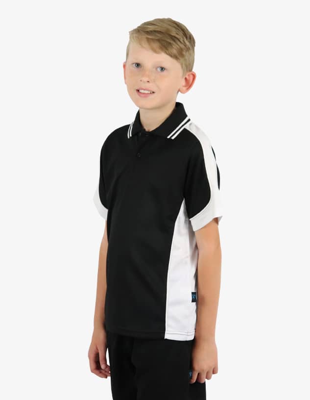 A black and white polo shirt featuring a logo, worn by a smiling child.