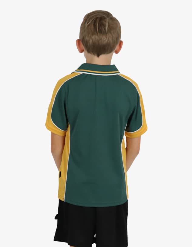 A green and yellow polo shirt is worn by a child, featuring a logo. The view is from the back.