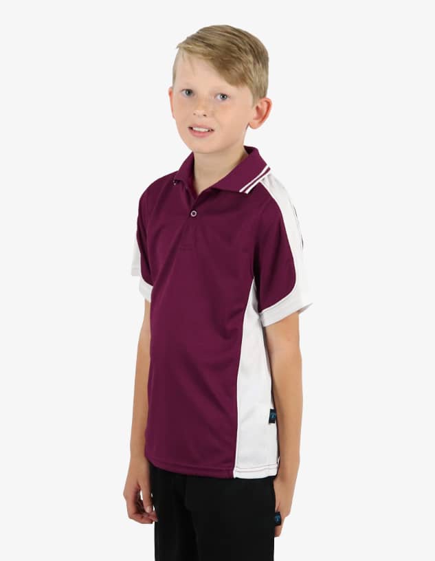 A maroon and white polo shirt for children featuring a logo on the sleeve.